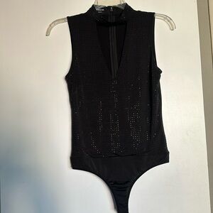 BEBE Shimmer bodysuit size M.